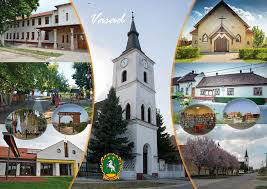 A postcard of Vasad — the church, the castle, and the village streets
